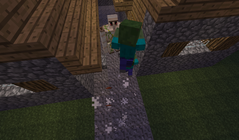 Plik:Iron Golem backing off a village during a siege.png